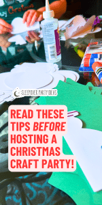 Christmas crafts on a holiday party table for a Christmas holiday craft party