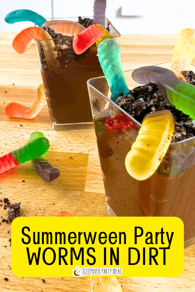 Summerween Party Foods for Summer Desserts Worms in Dirt Recipe worms in dirt pudding cups on a Summerween party buffet table with text on top